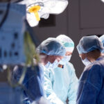 Surgeons operating